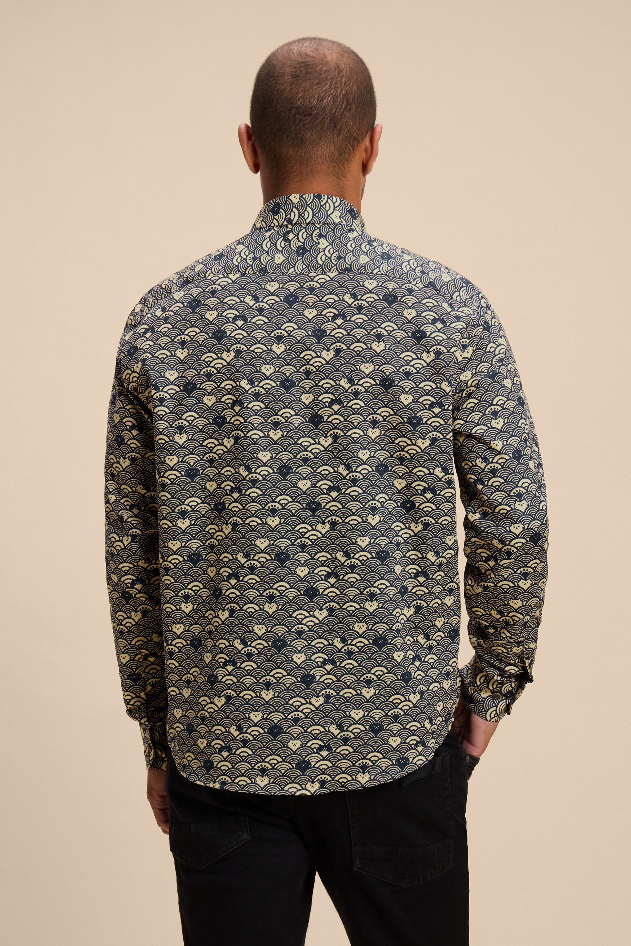 Wave Cats Blue shirt, back on model