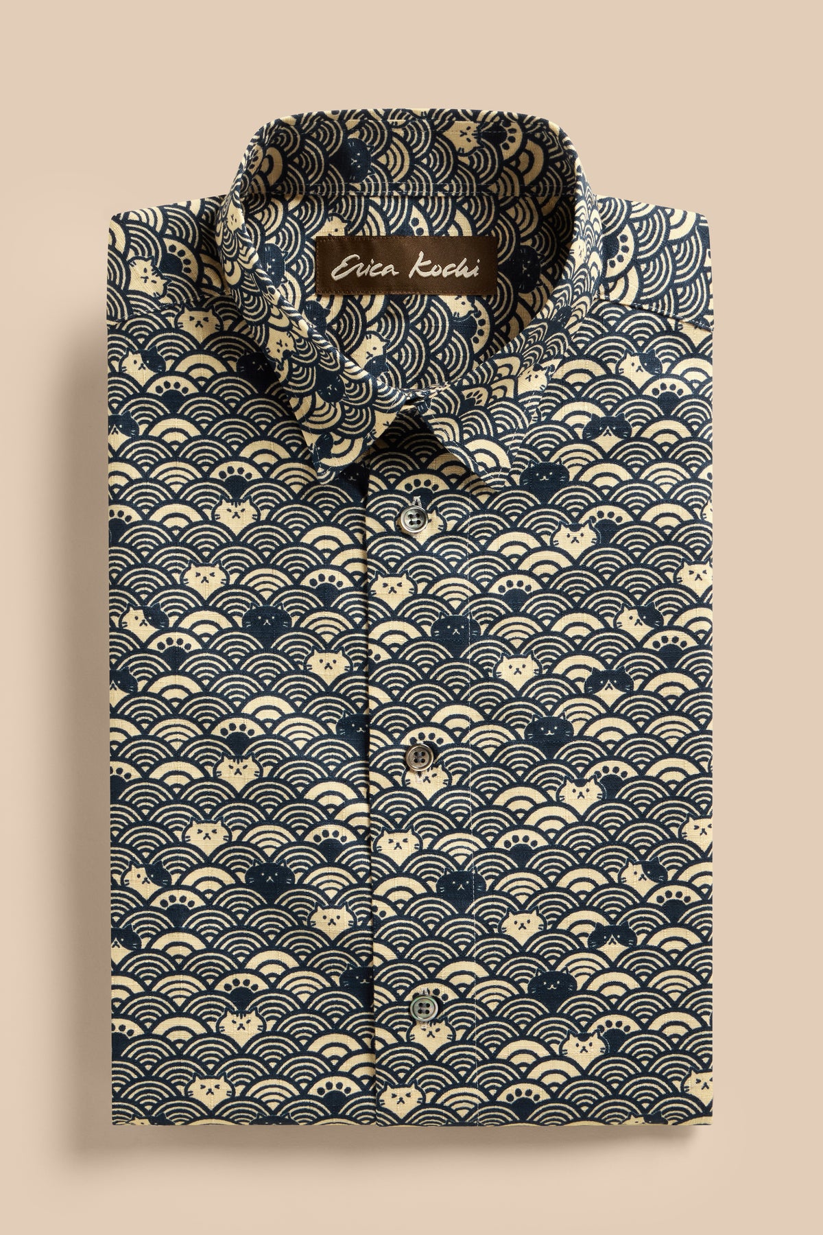 Wave Cats Blue shirt, flat lay